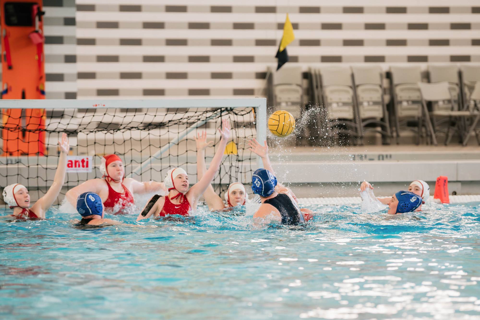 Player shoots the ball through defenders to score